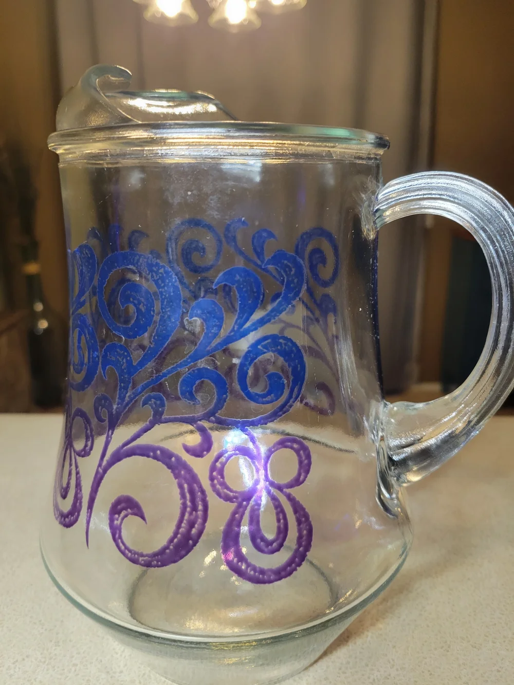 Vintage Glass Pitcher with Blue & Purple Scroll Design